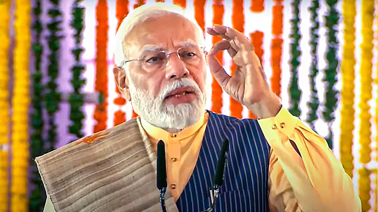 Prime Minister Narendra Modi addresses during an event organised for laying of foundation stone of various developmental projects, at Jagdalpur in Bastar district, Tuesday