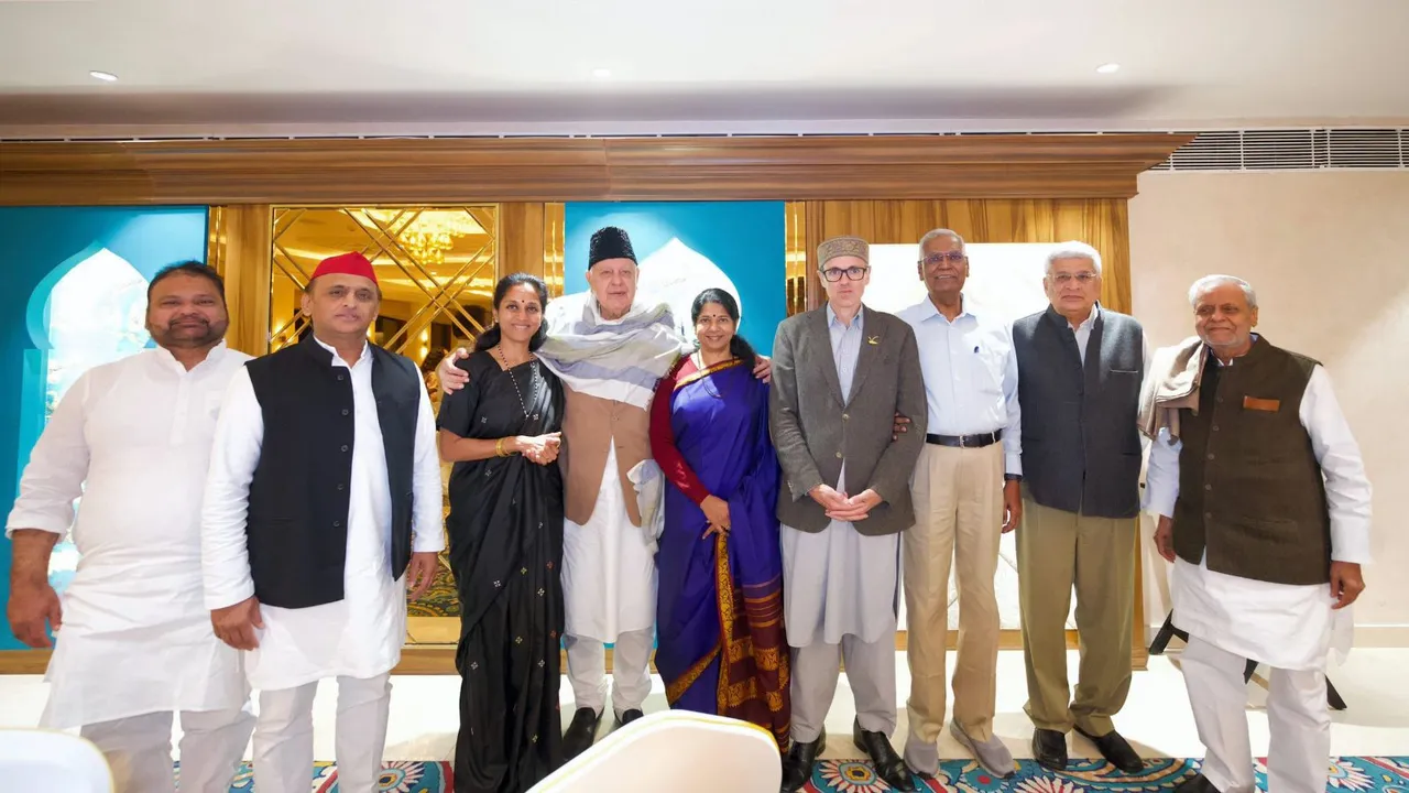 National Conference President Farooq Abdullah and J&K CM-designate Omar Abdullah with Akhilesh Yadav, Kanimozhi Karunanidhi, Supriya Sule, and D Raja before the swearing-in ceremony, in Srinagar.