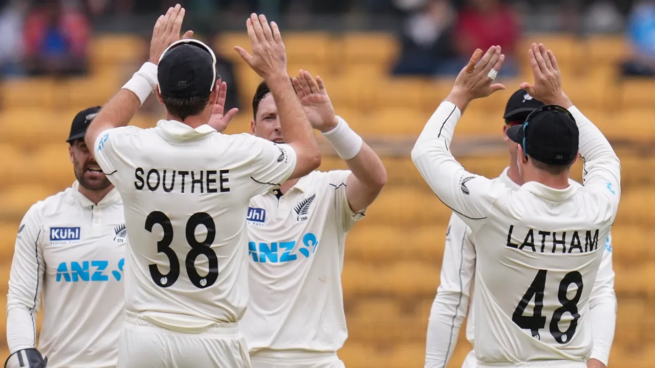 New Zealand's Matt Henry celebrates with teammates after taking the wicket of India's Ravindra Jadeja during the second day of the first Test cricket match between India and New Zealand, at M Chinnaswamy Stadium, in Bengaluru, Thursday, Oct. 17, 2024