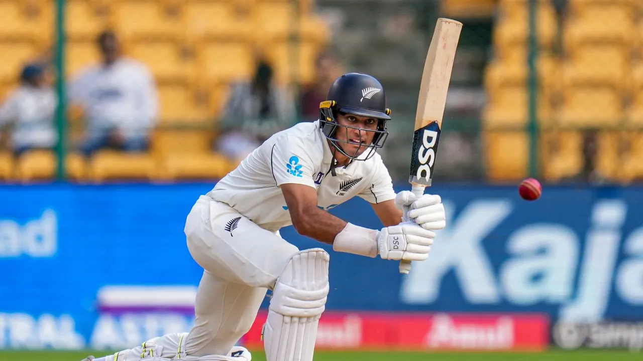 New Zealand's Rachin Ravindra plays a shot on the third day of the first test cricket match between India and New Zealand