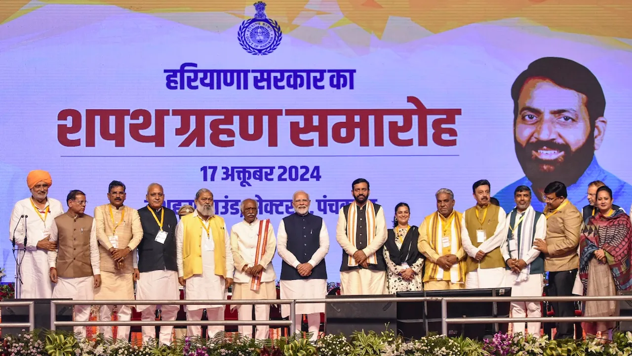 Prime Minister Narendra Modi and Haryana Governor Bandaru Dattatrey with newly sworn-in Haryana Chief Minister Nayab Singh Saini and Cabinet ministers at the oath ceremony at Dussehra Ground, in Panchkula, Thursday, Oct. 17, 2024.