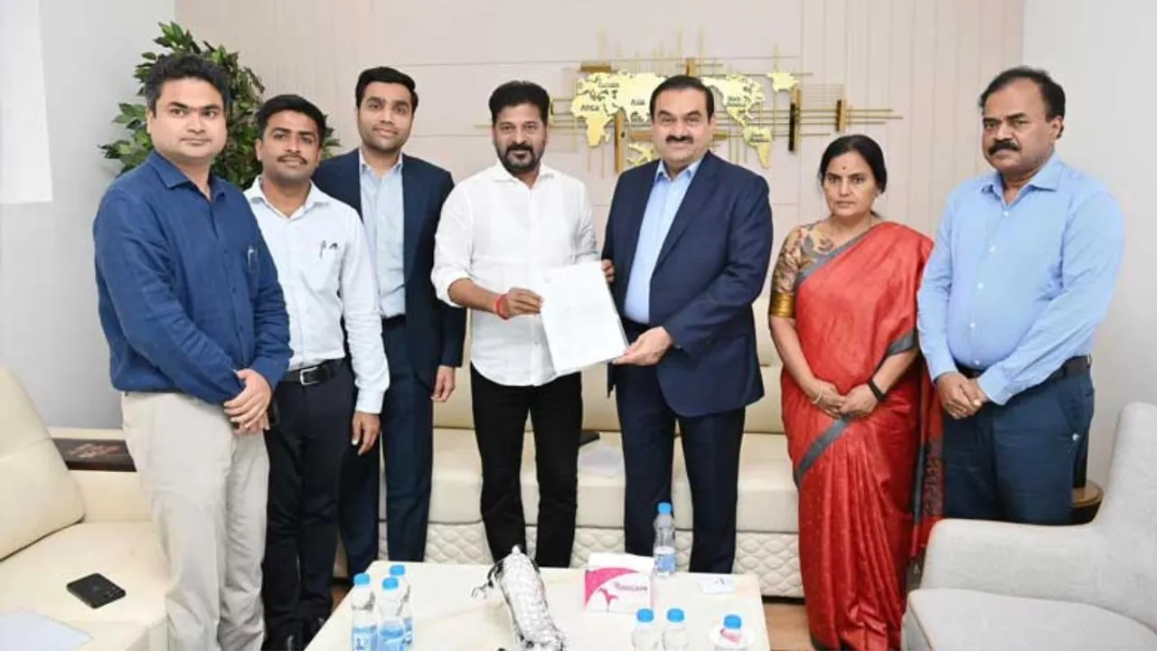 Gautam Adani and A Revanth Reddy