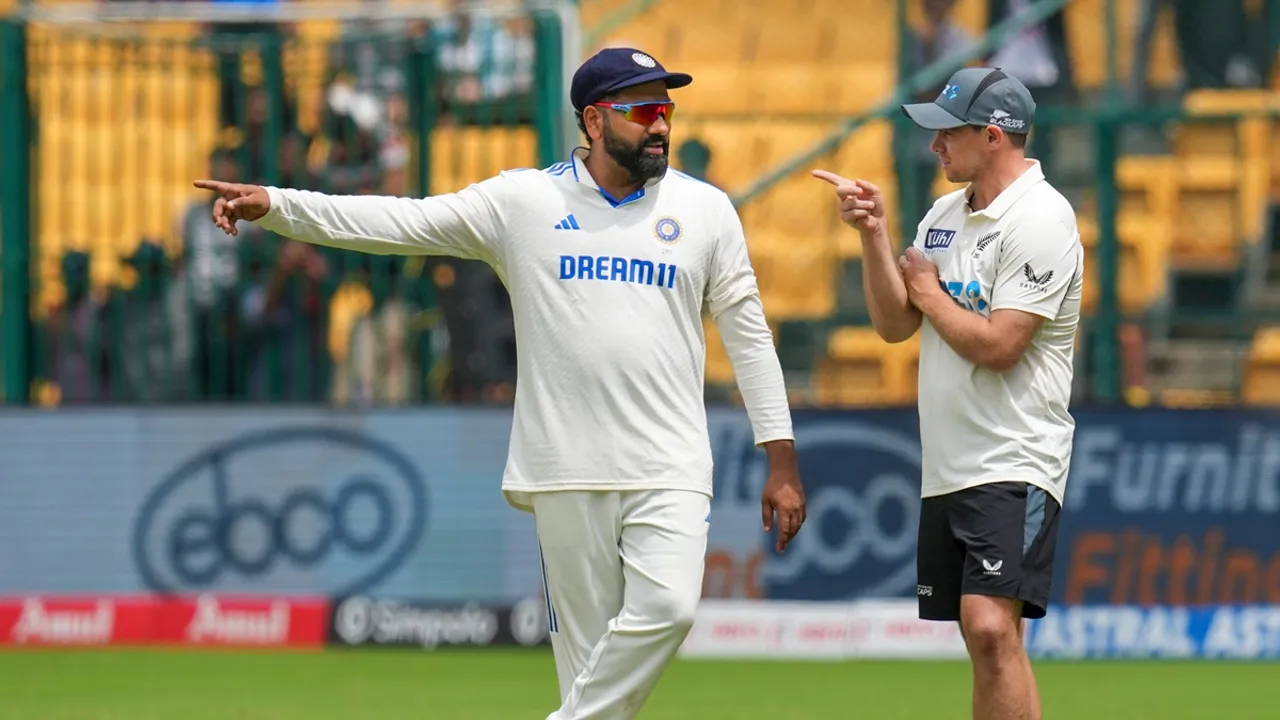 India's captain Rohit Sharma and New Zealand's captain Tom Latham during the presentation ceremony after New Zealand won the first test cricket match against India, at the M Chinnaswamy Stadium, in Bengaluru, Sunday, Oct. 20, 2024.