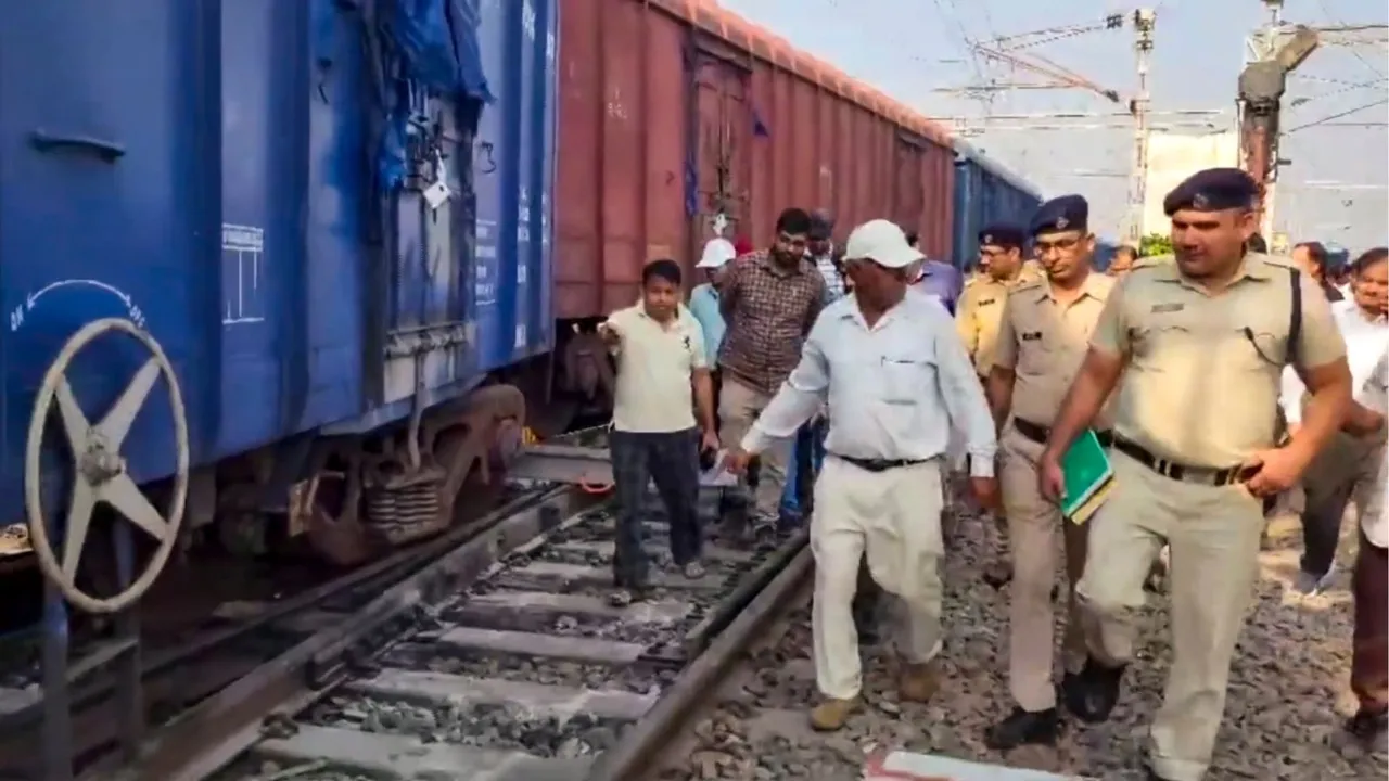 Police and other officials at the site where a goods train derailed near Saharanpur, on Friday, Oct. 25, 2024.