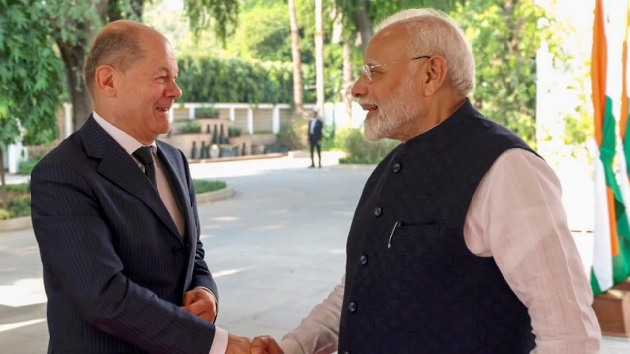 Prime Minister Narendra Modi shakes hands with German Chancellor Olaf Scholz during a meeting at his residence, in New Delhi, Friday, Oct. 25, 2024.