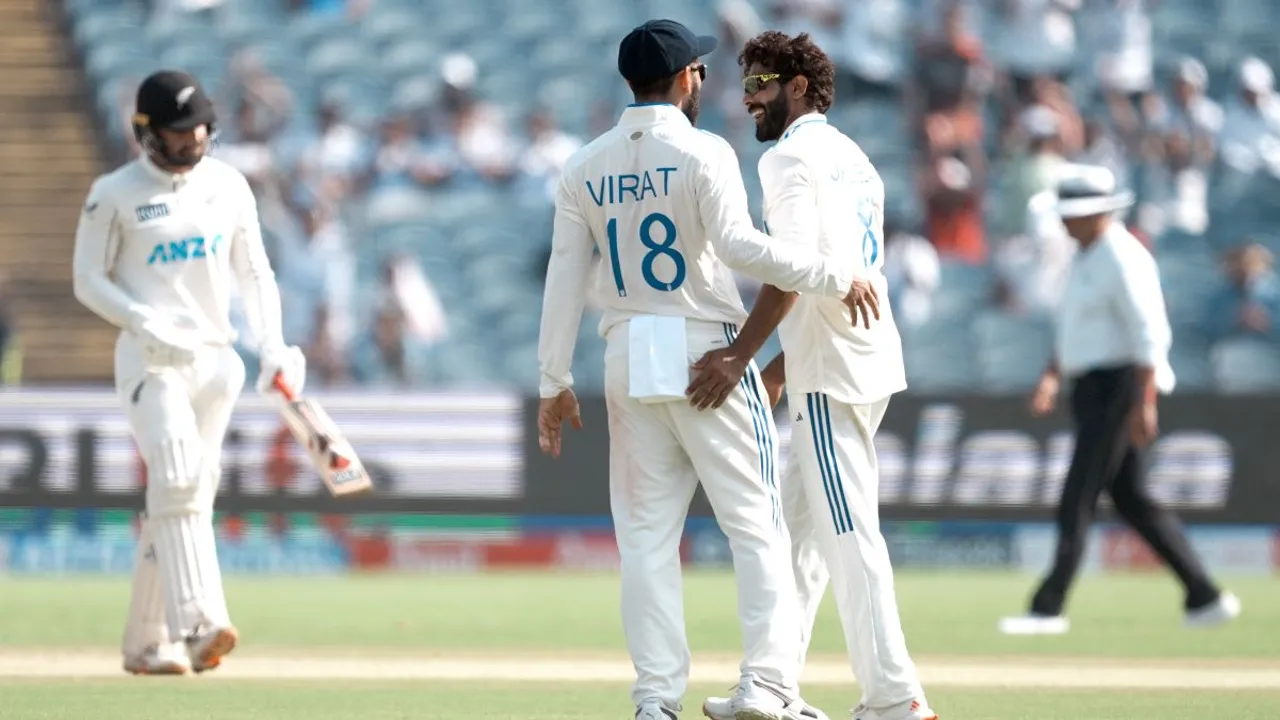 India's Ravindra Jadeja celebrates with Virat Kohli after taking the wicket of New Zealand's Tom Blundell on the third day of the second test cricket match between India and New Zealand, at the Maharashtra Cricket Association Stadium, in Pune, Saturday, Oct. 26, 2024
