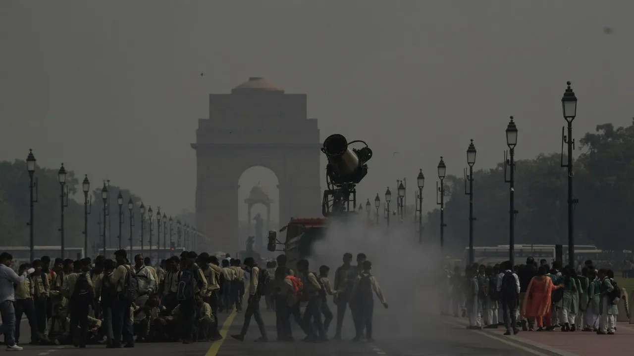 An anti-smog gun being used at the Kartavya Path to curb air pollution, near the India Gate, in New Delhi