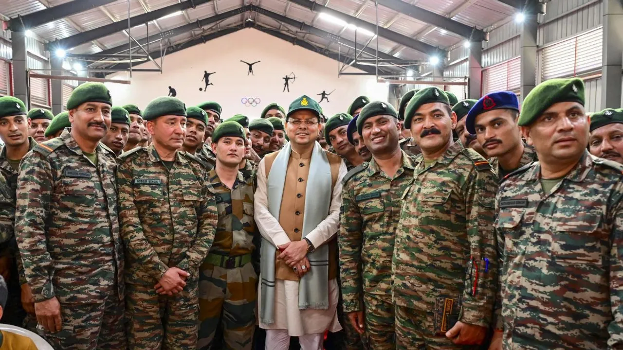 Uttarakhand Chief Minister Pushkar Singh Dhami with army personnel during celebration of Diwali festival, at Lansdowne Cantonment in Pauri Garhwal district, Thursday, Oct. 31, 2024