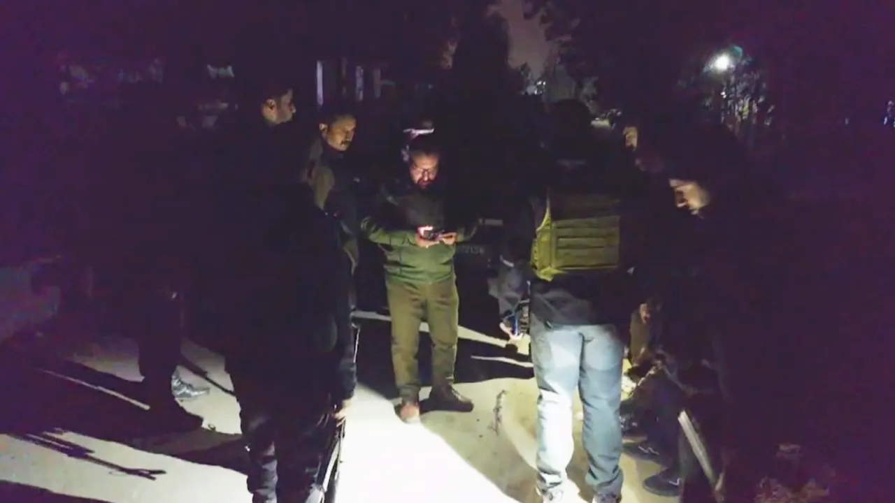 Security personnel conduct investigation after two persons from Uttar Pradesh were shot at by militants, in Jammu and Kashmir's Budgam district, Friday, Nov 1, 2024.