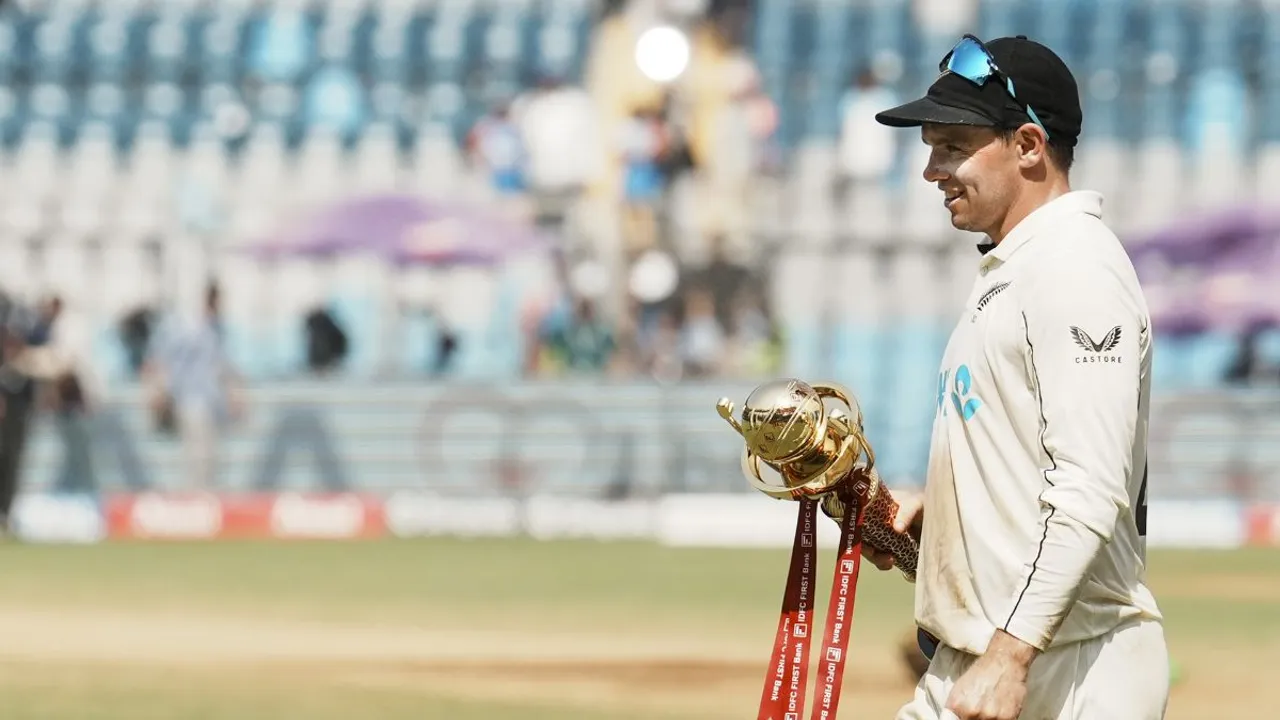 Tom Latham with trophy