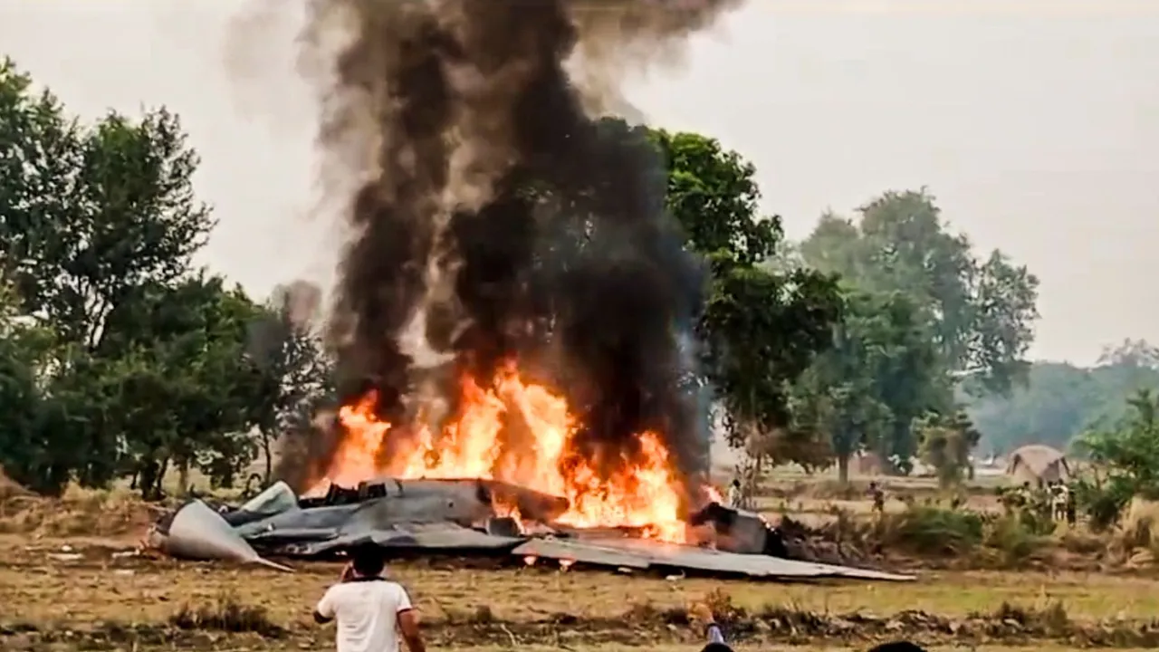 Smoke billows out after an IAF plane crashed, near Agra, Monday, Nov. 4, 2024.