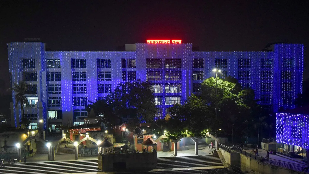 Newly-built modern complex of the Patna Collectorate along the banks of Ganga river illuminated ahead of the 'Chhath Puja' festival, in Patna, Sunday, Nov. 3, 2024.