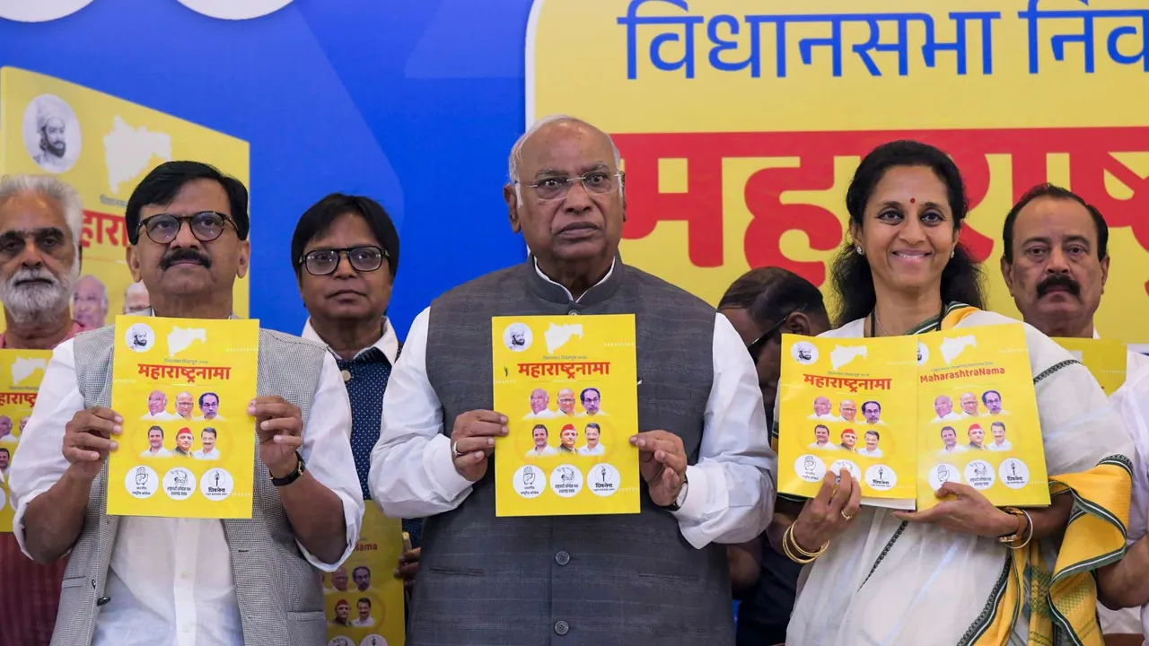 Congress President Mallikarjun Kharge, Shiv Sena (UBT) MP Sanjay Raut and NCP (SP) MP Supriya Sule release MVA's manifesto for Maharashtra Assembly elections, in Mumbai, Sunday, Nov. 10, 2024.
