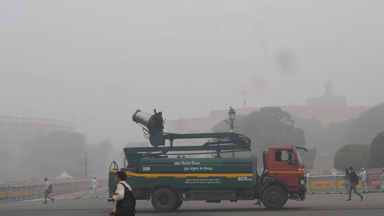 An anti-smog gun being used to spray water droplets to curb air pollution amid smog, in New Delhi, Wednesday, Nov. 13, 2024.