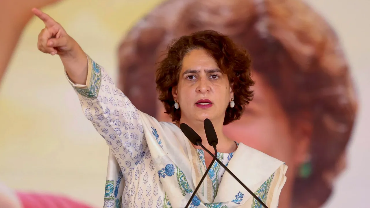 Congress General Secretary Priyanka Gandhi with party leader Bajrang Punia during a public meeting for Maharashtra Assembly elections, in Kolhapur.