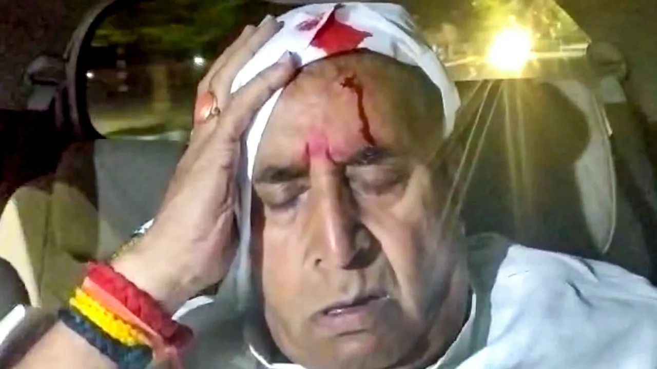 Former Maharashtra minister and NCP (SP) leader Anil Deshmukh suffers injuries after stones were hurled at his car, in Nagpur district, Monday, Nov. 18, 2024.