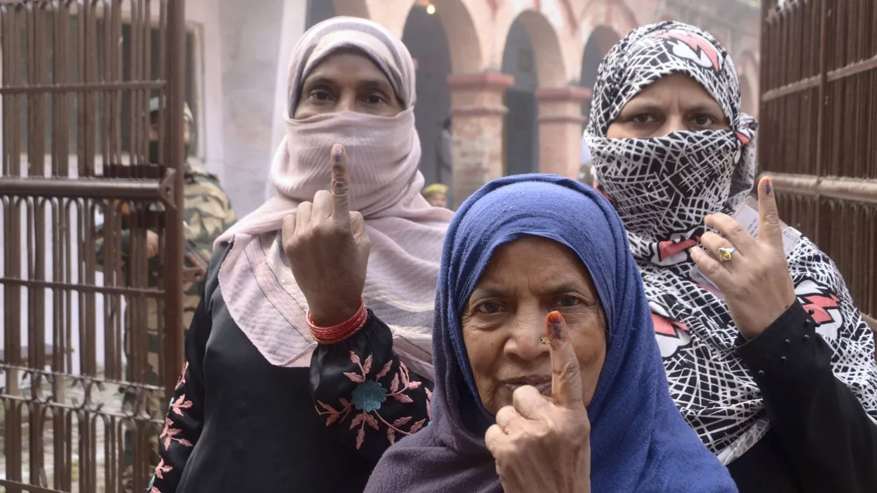 Voters show their ink-marked finger after casting a vote during UP's Sisamau Assembly constituency bypoll, in Kanpur, Wednesday, Nov. 20, 2024.