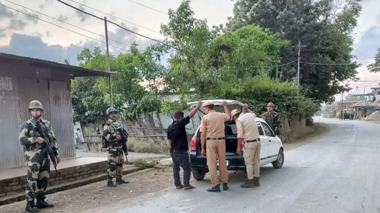 Security personnel during a search operation in the fringe and vulnerable areas of hill and valley districts of Manipur.