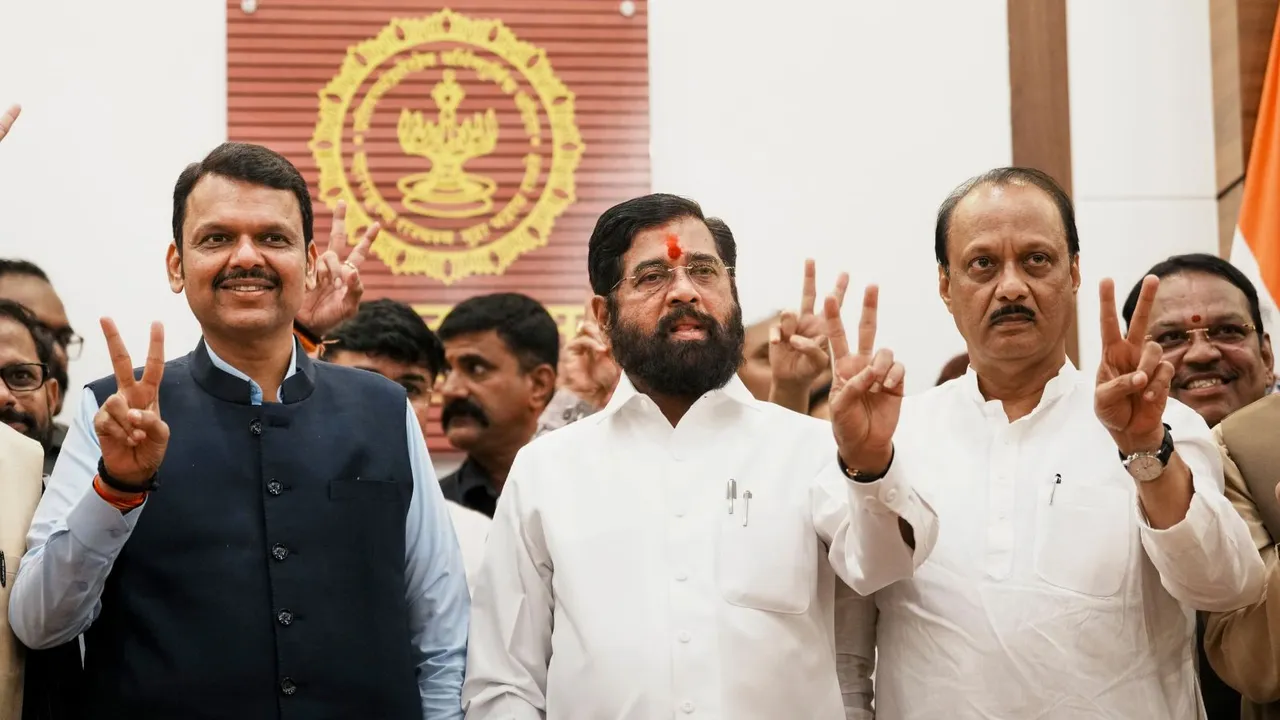 Maharashtra Chief Minister Eknath Shinde with Deputy Chief Ministers Devendra Fadnavis and Ajit Pawar celebrates the victory, in Mumbai, Saturday, Nov. 23, 2024.