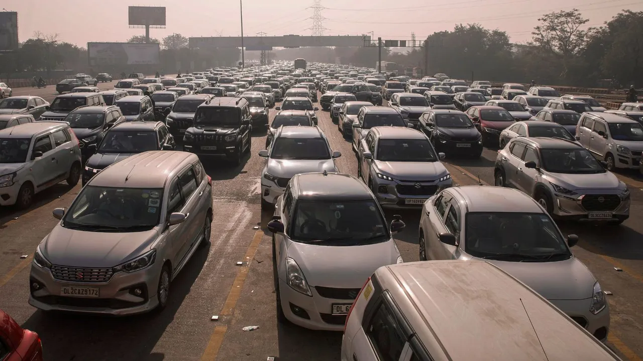 Vehicles stuck in a traffic jam on Delhi-Noida Direct Flyway after security was heightened in view of farmers' protest march towards the national capital, in Noida, Monday, Dec. 2, 2024.