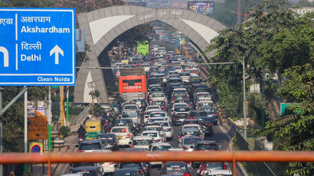 Vehicles stuck in a traffic jam on a road near Delhi-Noida border after security was heightened in view of farmers' protest march towards the national capital, in New Delhi, Monday, Dec. 2, 2024.