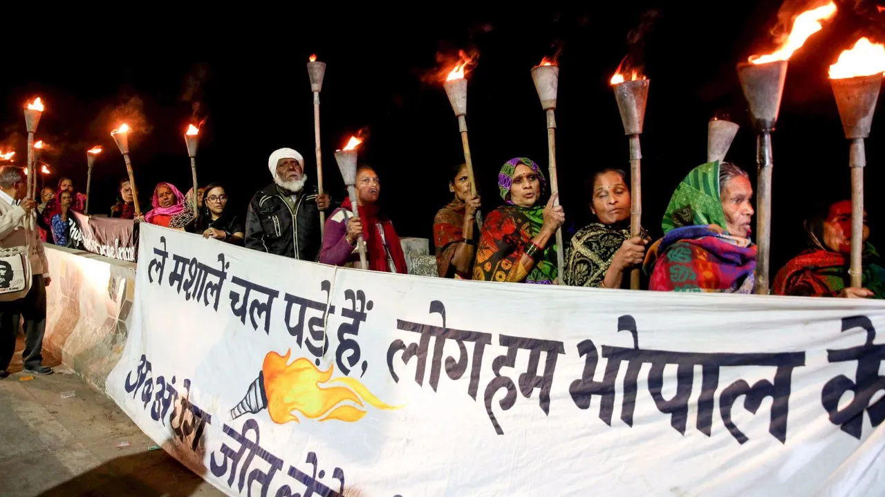 Survivors of the 1984 Bhopal gas tragedy take out a torch rally to mark the 40th anniversary of the disaster, in Bhopal