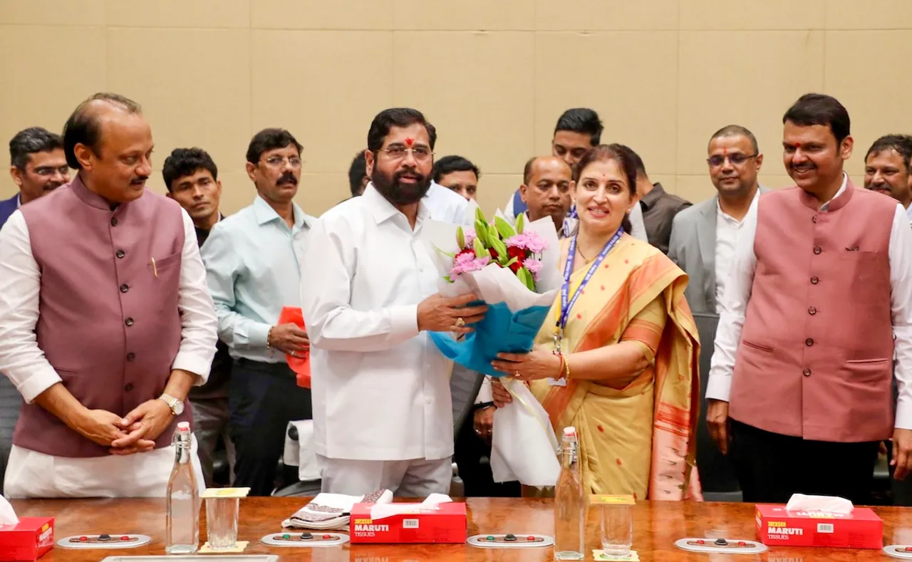 Maharashtra Chief Minister Devendra Fadnavis and Deputy CM Ajit Pawar look on as Deputy CM Eknath Shinde gets felicitated by Chief Secretary of Maharashtra Sujata Saunik at the Cabinet meeting, in Mumbai. 