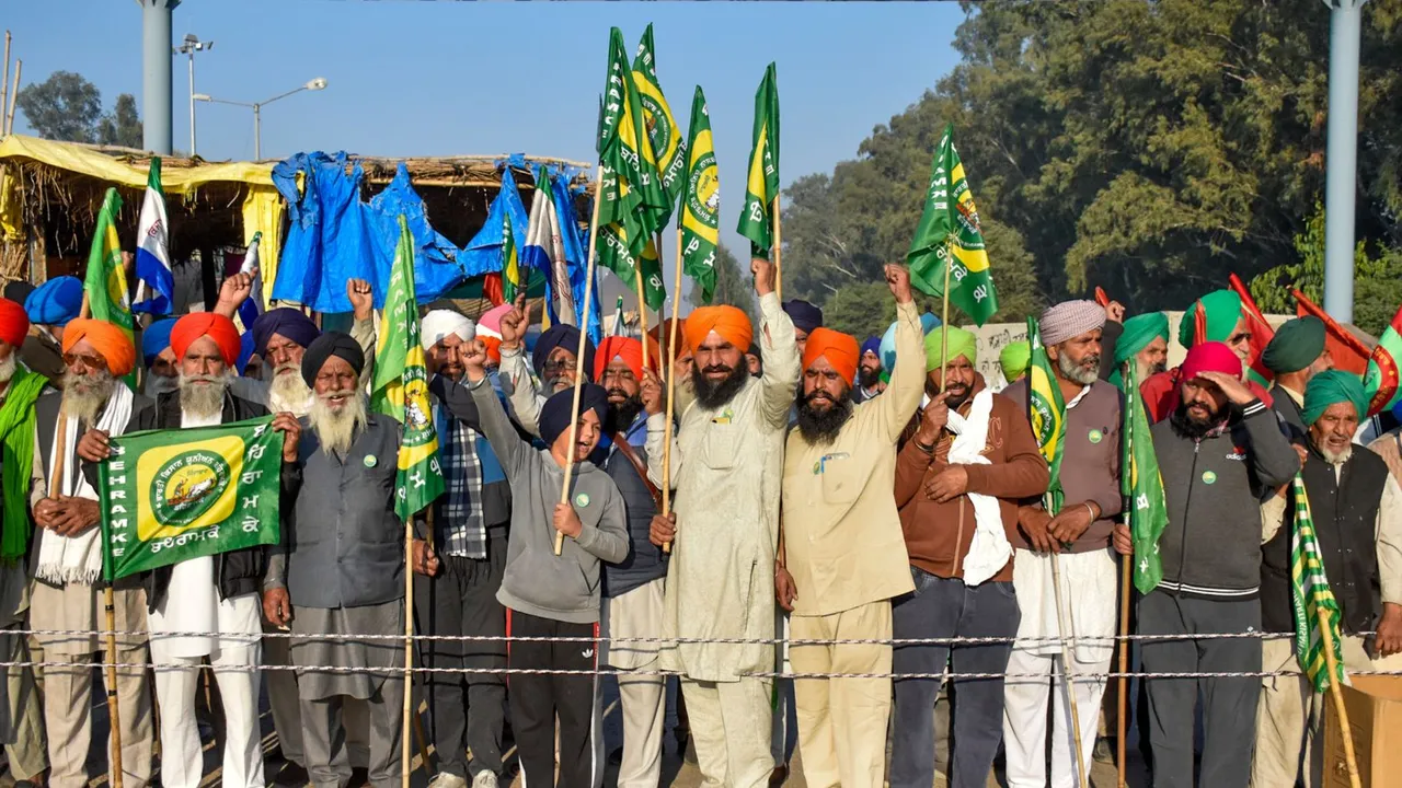 Farmers gather at Shambhu border before the commencement of their 'Delhi Chalo' march towards the national capital, in Patiala district, Punjab, Friday, Dec. 6, 2024.