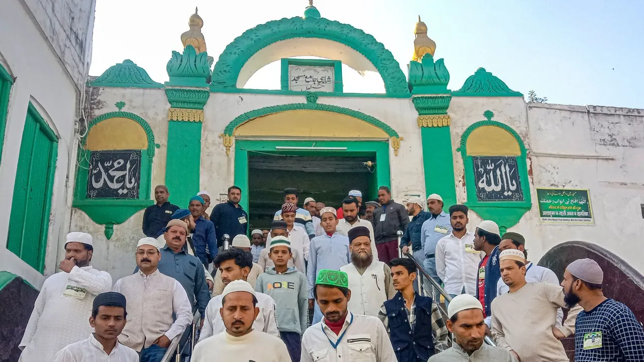 Devotees leave Shahi Jama Masjid after offering prayers, in Sambhal, Friday, Dec. 6, 2024.