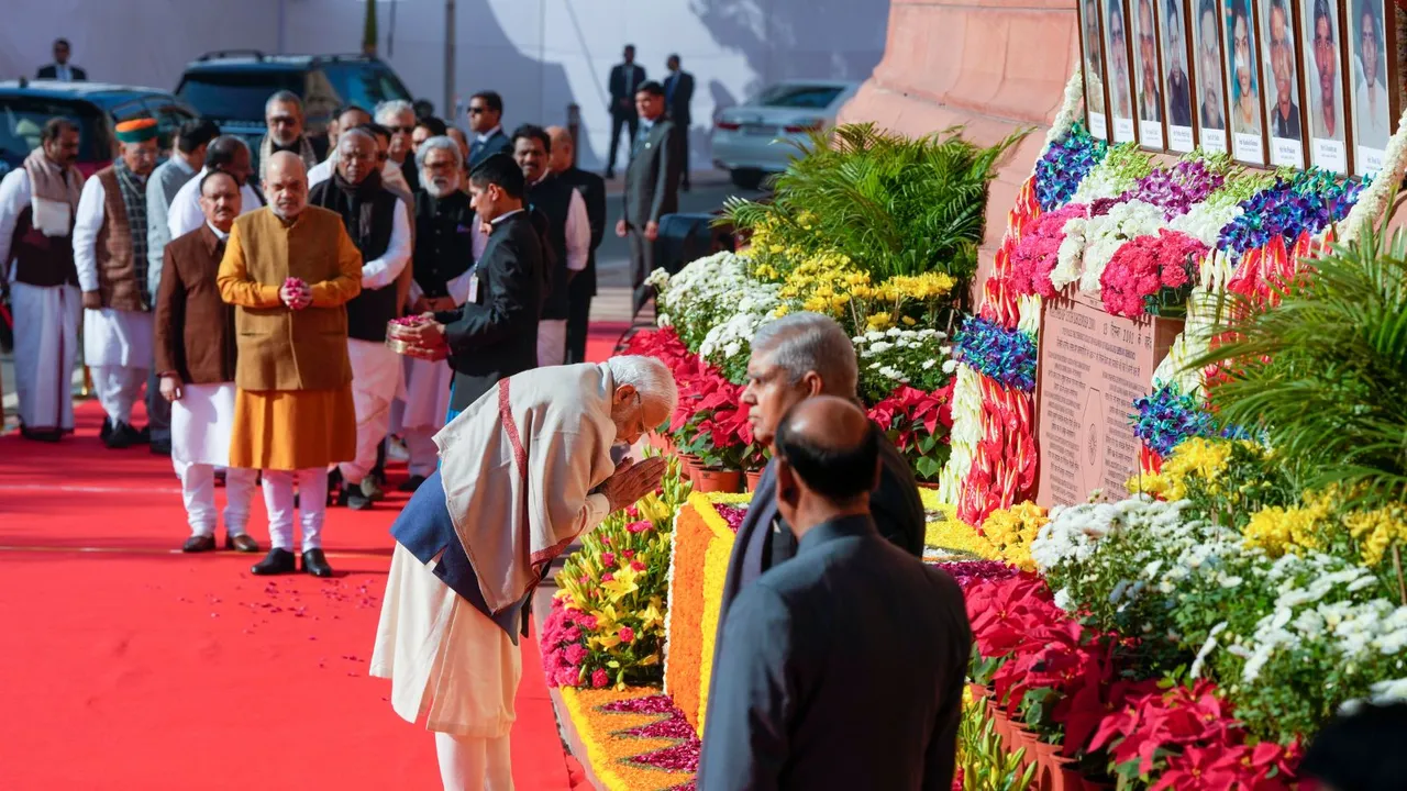 Prime Minister Narendra Modi pays tribute to the martyrs of the 2001 Parliament attack to mark its 23rd anniversary, at the Parliament in New Delhi, Friday, Dec. 13, 2024.
