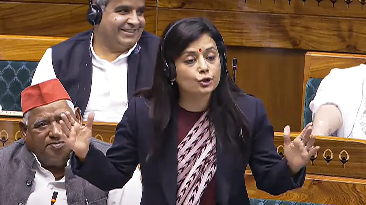 TMC MP Mahua Moitra speaks in the Lok Sabha during the Winter session of Parliament, in New Delhi, Friday, Dec. 13, 2024.
