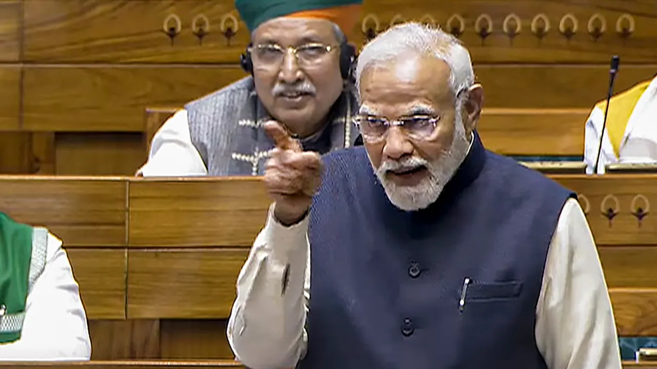 Prime Minister Narendra Modi speaks in the Lok Sabha during the discussion on the 'glorious journey of 75 years of the India Constitution', in the ongoing Winter session of Parliament in New Delhi on Saturday, Dec. 14, 2024.