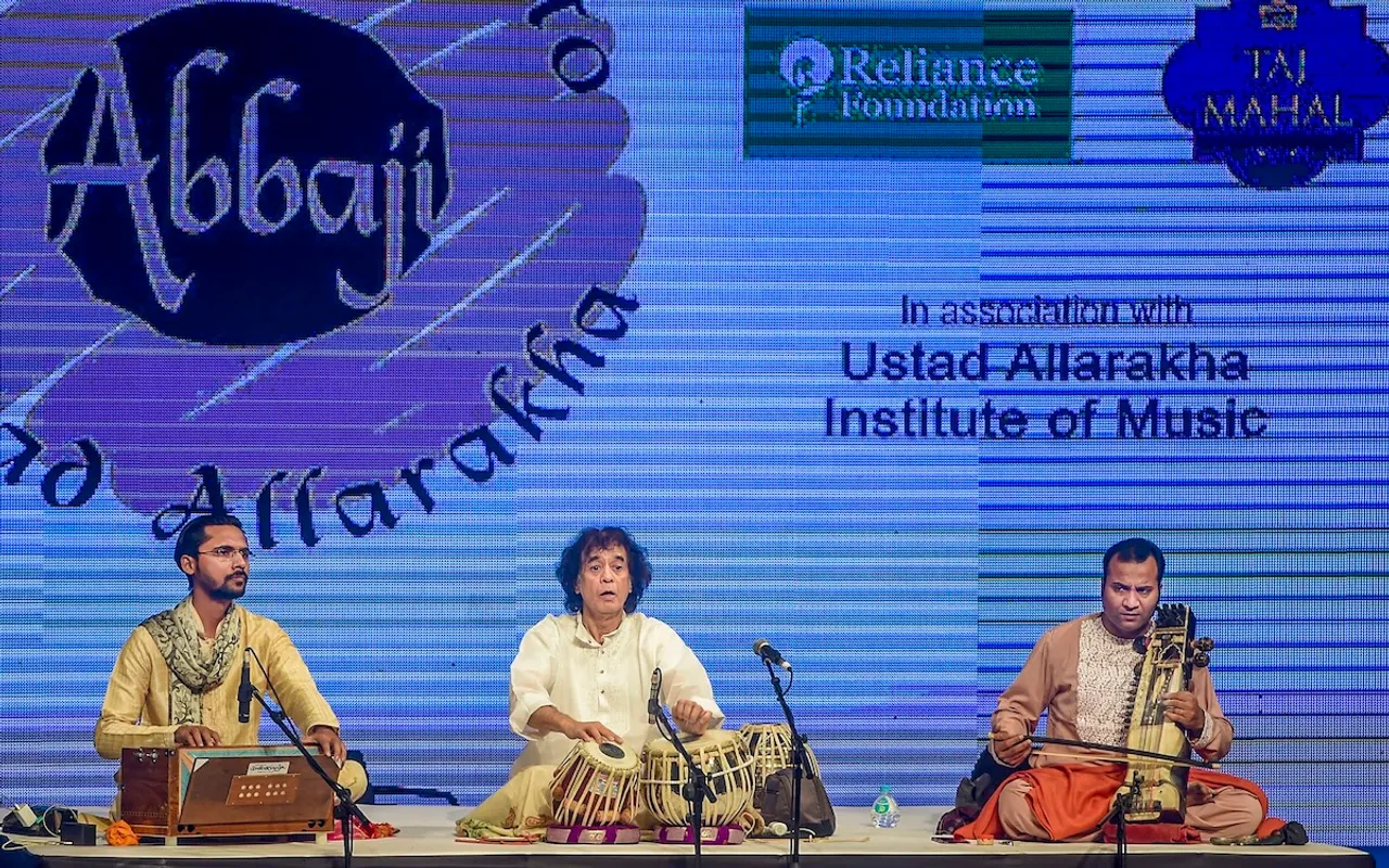 In this Monday, Feb. 3, 2020 file image Tabla maestro Ustad Zakir performs at a concert in Mumbai