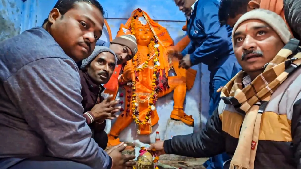 Devotees offer prayers at Shri Kartik Mahadev Temple (Bhasma Shankar temple) that reopened on December 13 after being shut for 46 years, in Sambhal