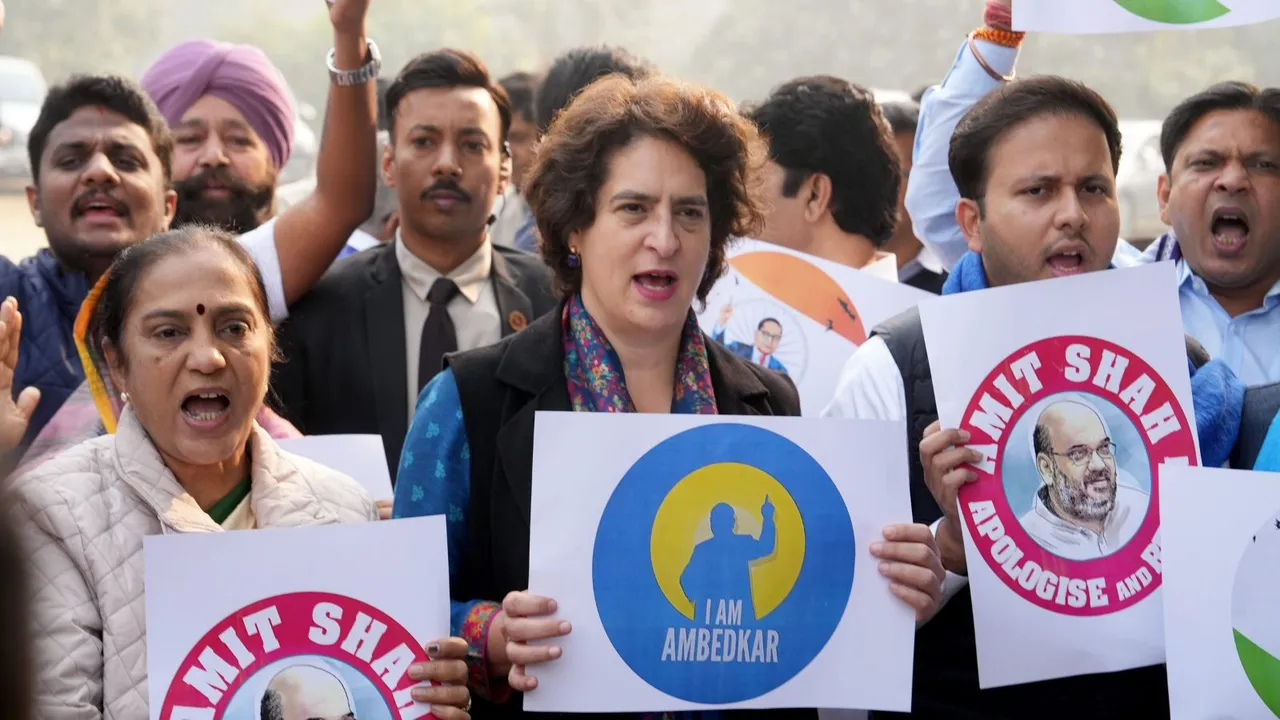 Congress MP Priyanka Gandhi Vadra with other INDIA bloc MPs during a protest against Home Minister Amit Shah over his remarks related to B R Ambedkar, at Vijay Chowk, in New Delhi, Friday, Dec. 20, 2024.