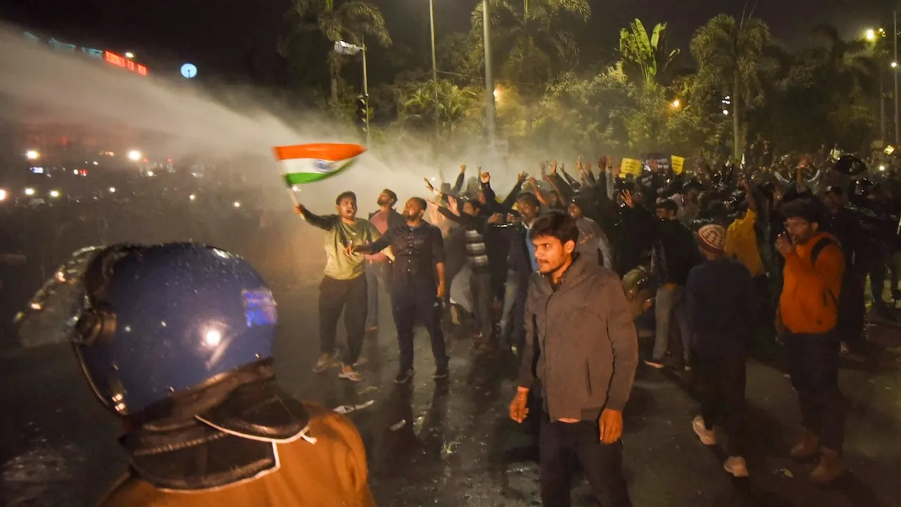 Police use water cannons to disperse aspirants protesting against the alleged paper leak and irregularities in the BPSC 70th Integrated Combined Competitive Examination (CCE), in Patna, Sunday, Dec. 29, 2024.