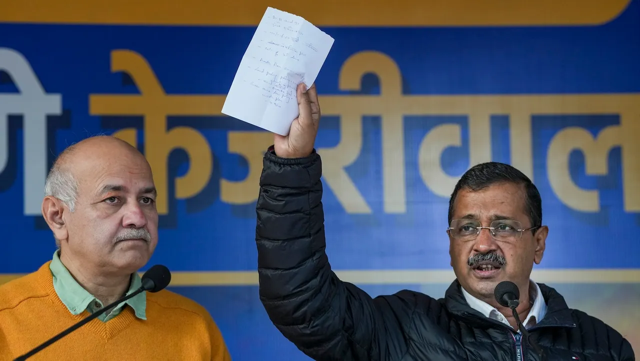 Arvind Kejriwal, right, and Manish Sisodia address a press conference in New Delhi on Sunday, Jan. 5, 2025.