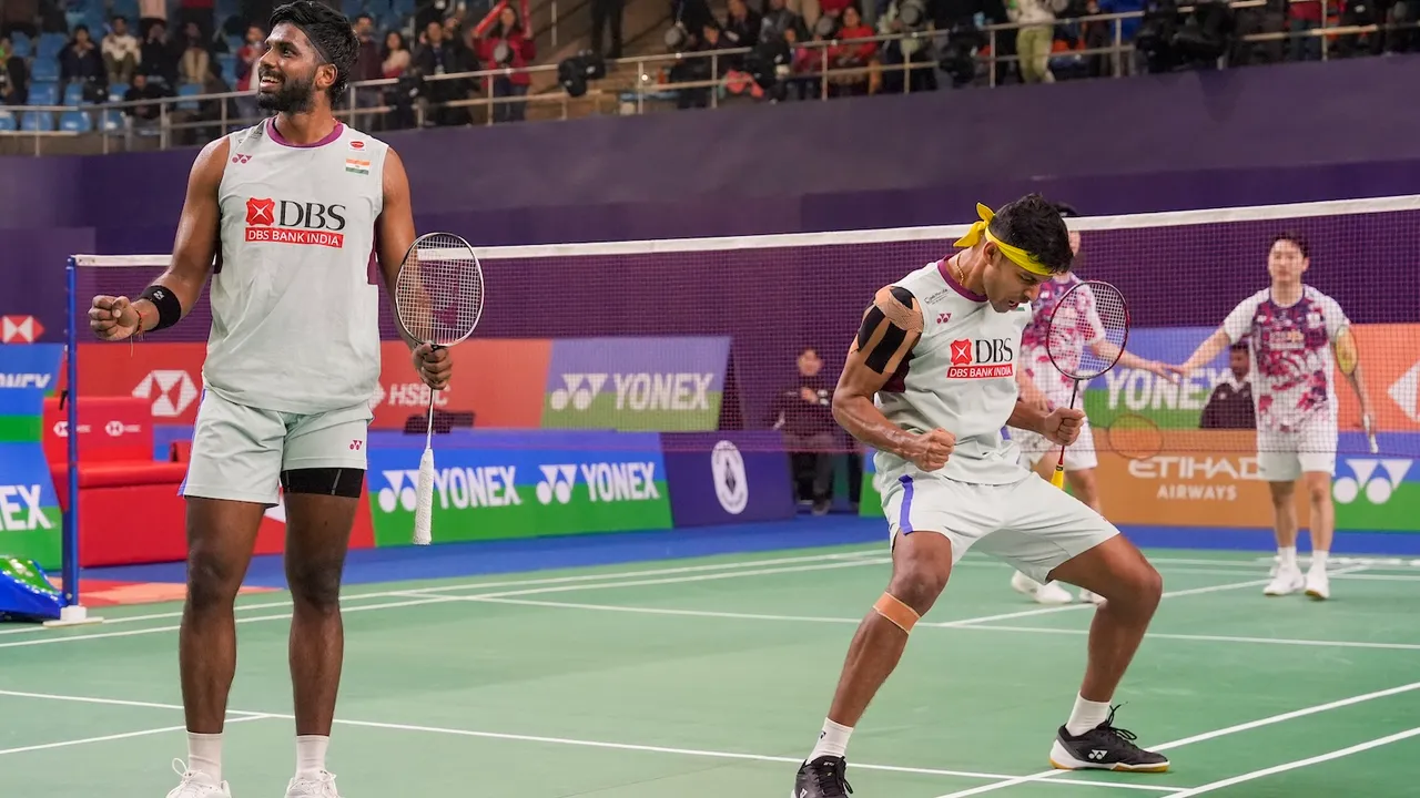 Satwiksairaj Rankireddy and Chirag Shetty celebrate after winning the men's doubles quarterfinal match against South Korea's Kang Min Hyuk and Jin Yong at the India Open 2025 badminton tournament in New Delhi on Friday, Jan. 17, 2025. 