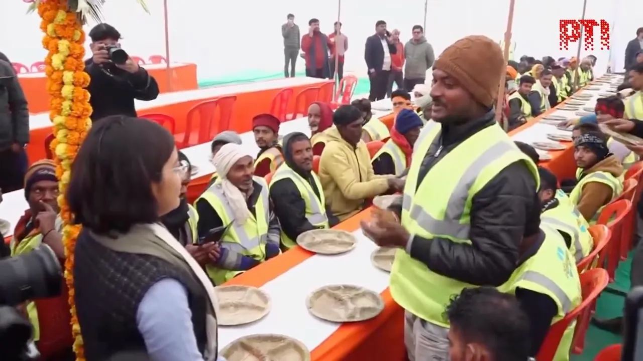 Community lunch organised by the administration for sanitation workers involved in Maha Kumbh Mela 2025 preparations in Prayagraj