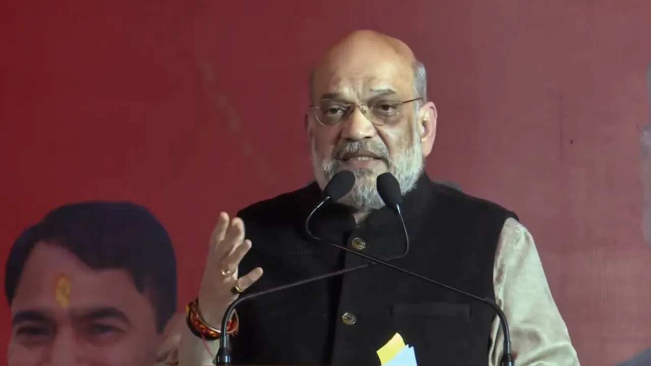 Amit Shah speaks during a public meeting for the upcoming Delhi Assembly elections, at Narela, in New Delhi on Sunday, January 26, 2025.