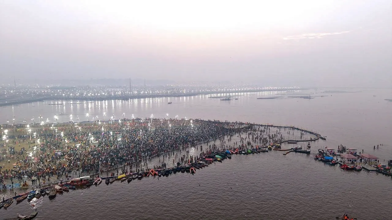 In this image via @myogiadityanath on X on Feb. 3, 2025, devotees take a holy dip at the Sangam on the occasion of Basant Panchami during the ongoing Maha Kumbh Mela, in Prayagraj, Uttar Pradesh.