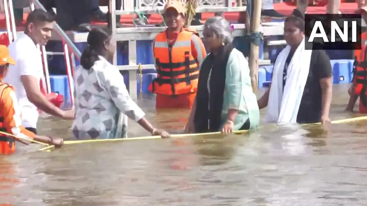President Droupadi Murmu takes a holy dip at Triveni Sangam on Monday, Feb 10, 2025.