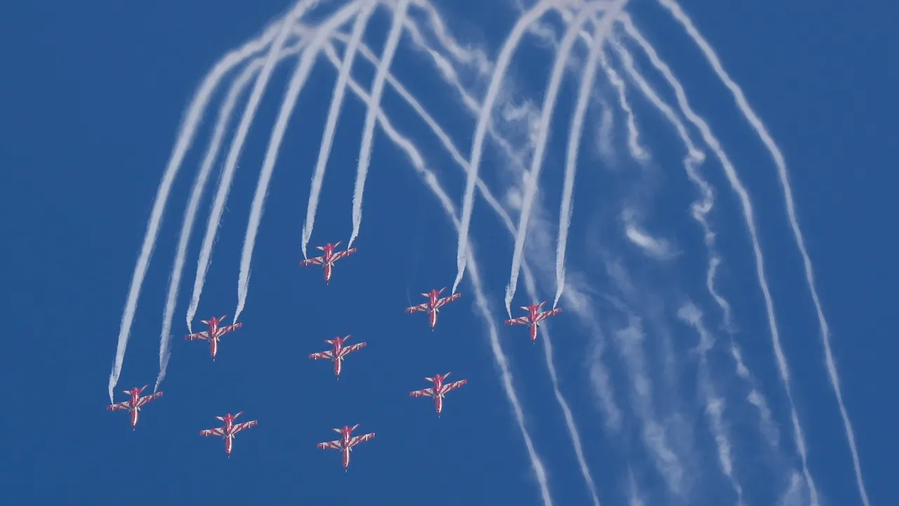 IAF's Surya Kiran Aerobatic Team (SKAT) showcases aerobatic skills during the inauguration of the 15th edition of Aero India 2025 at Yelahanka Airbase in Bengaluru on Monday, Feb. 10, 2025.