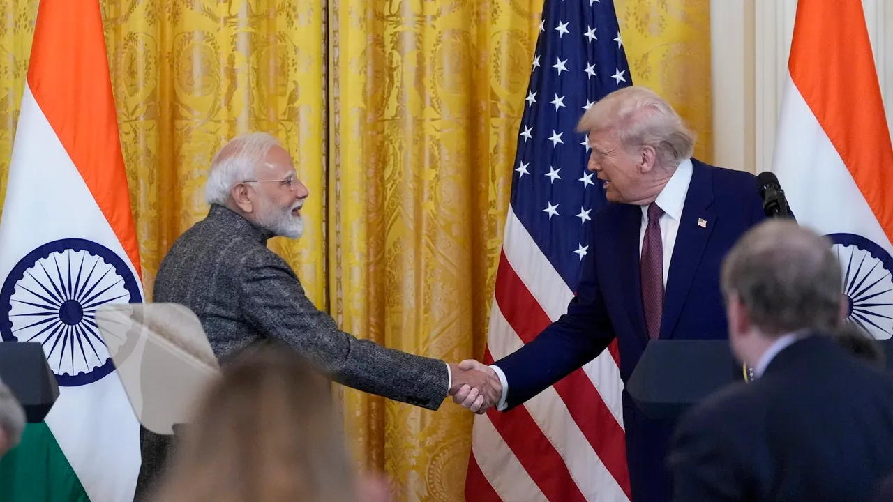 Prime Minister Narendra Modi speaks as President Donald Trump listens during a news conference in the East Room of the White House on Thursday, Feb. 13, 2025, in Washington.