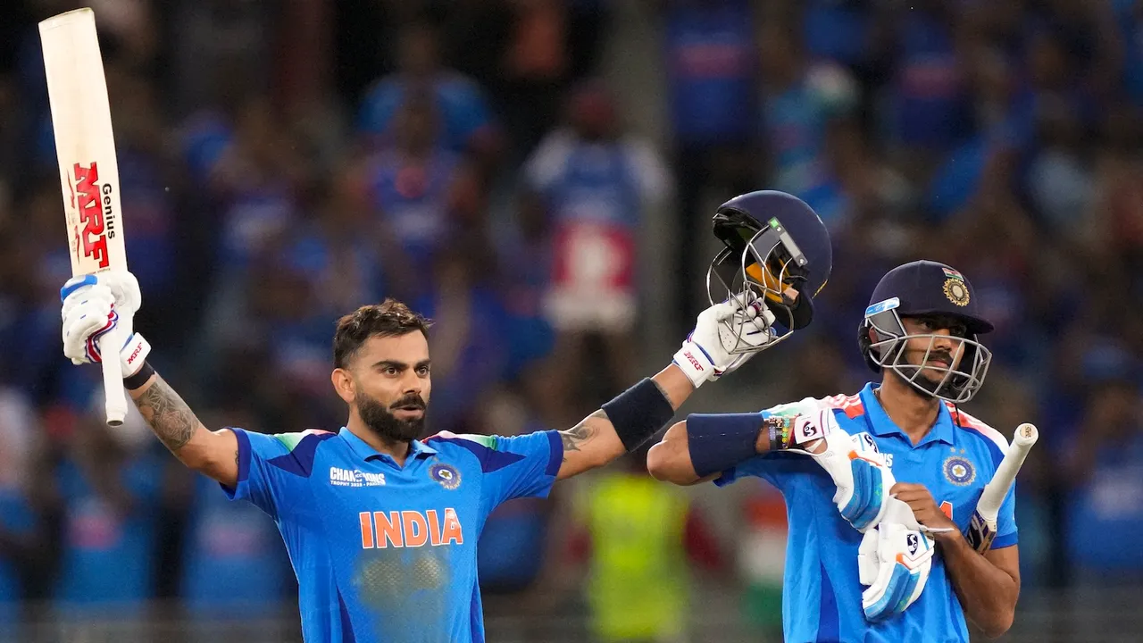 Virat Kohli, left, celebrates his century with Axar Patel after scoring the winning runs during the ICC Champions Trophy match against Pakistan in Dubai on Sunday, Feb. 23, 2025.