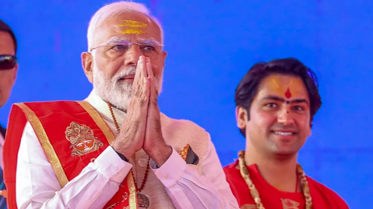 Narendra Modi during the foundation stone laying of Bageshwar Dham Medical & Science Research Institute, in Chhatarpur, Madhya Pradesh. Bageshwar Dham seer Dhirendra Shastri are also seen.