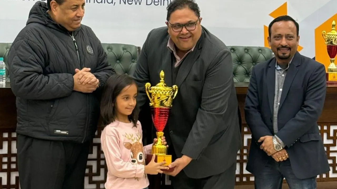 Adira Mukerji receives the Delhi State Chess Champion Trophy for U7 category