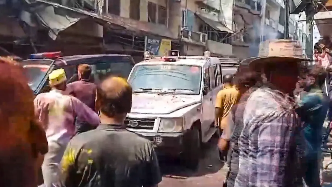  Security personnel patrol to maintain law and order after some children allegedly threw stones at 'Laat Sahab' procession in Shahjahanpur, Uttar Pradesh on Friday, March 14, 2025