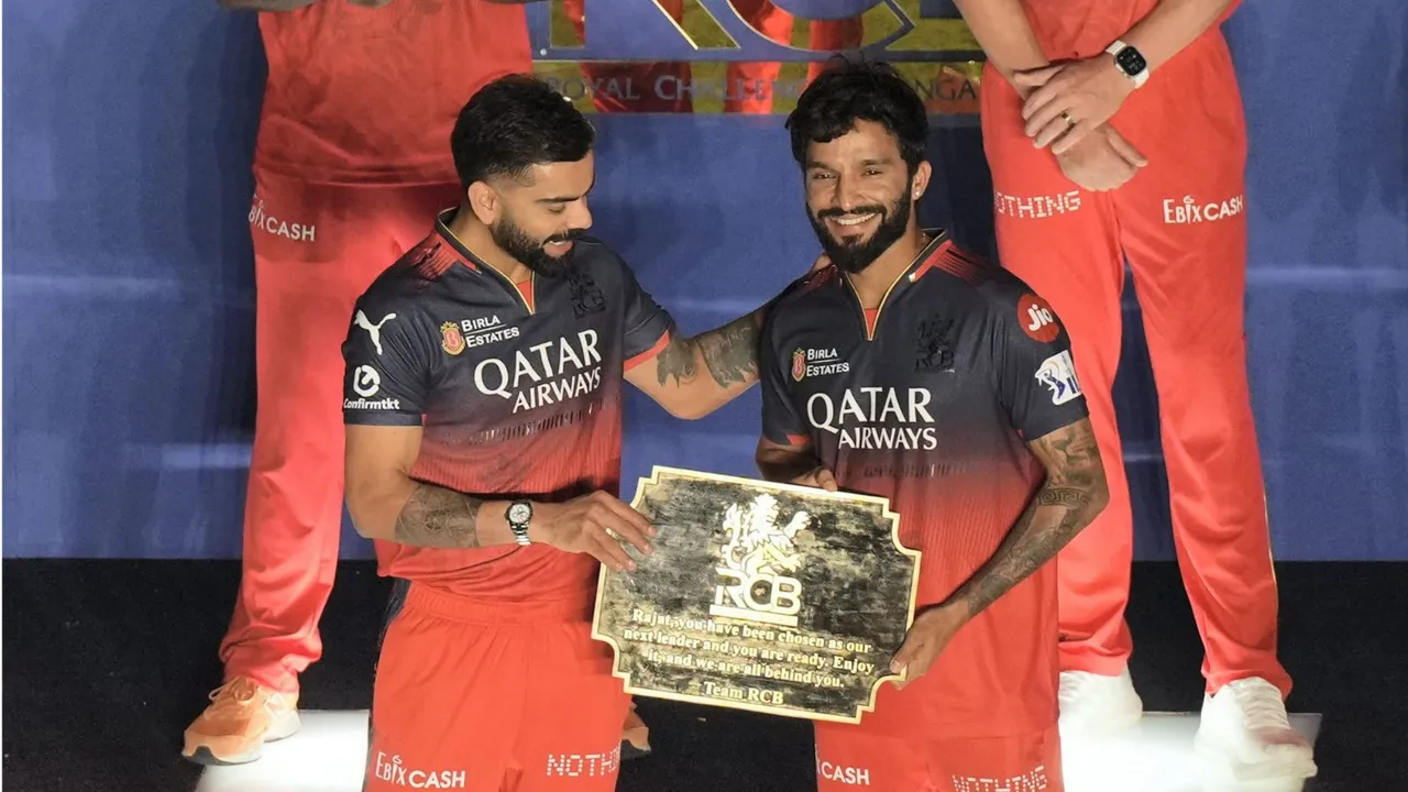 Virat Kohli with rajat Patidar image