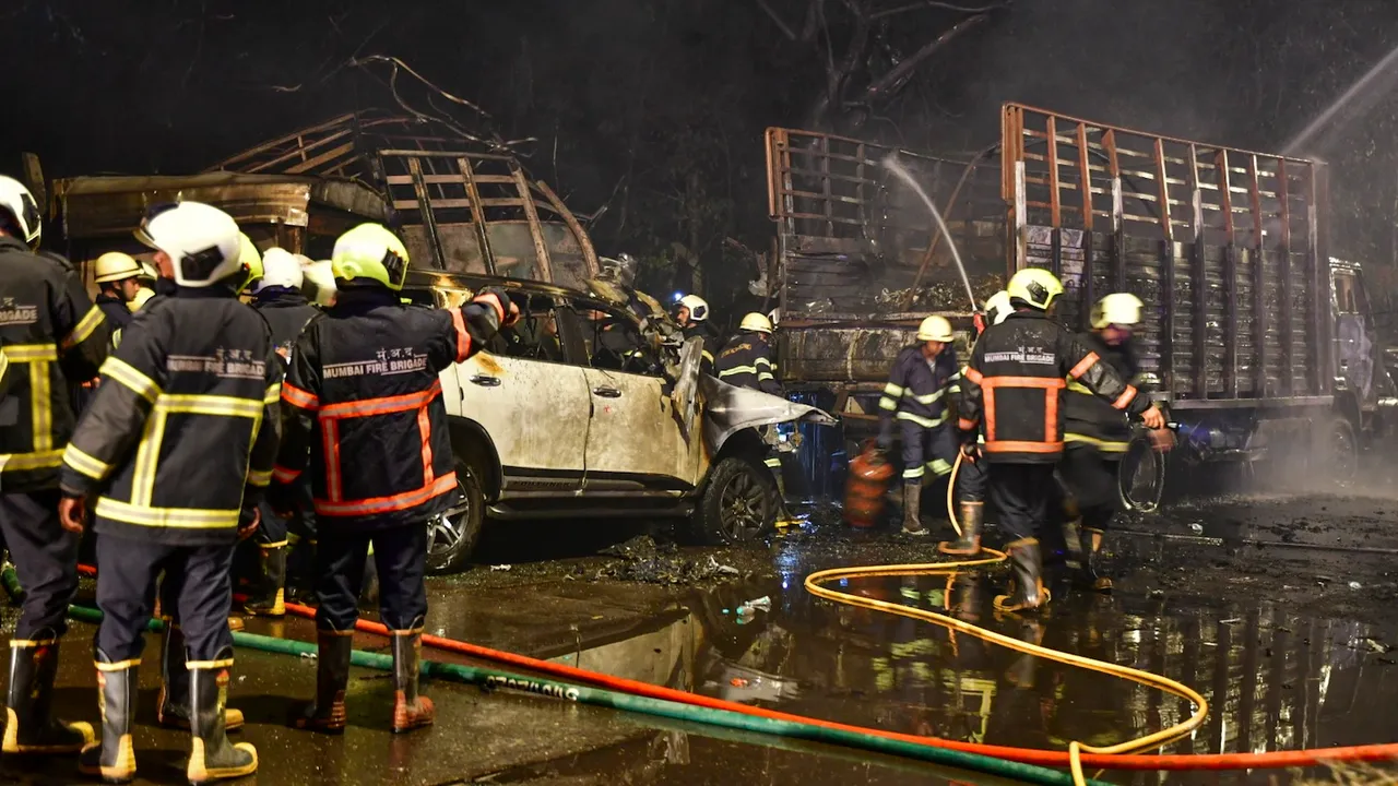 Firefighting team at the spot after a fire broke out following blasts in two gas cylinders in a truck, at Dharavi in Mumbai on Monday, March 24, 2025.